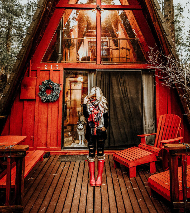 Red A-Frame Cabin with Girl in Hunter Red Boots Big Bear Rental California