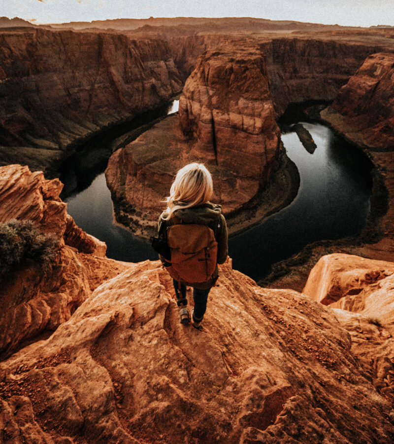 Girl on Edge at Horshoebend Page Arizona Sunset