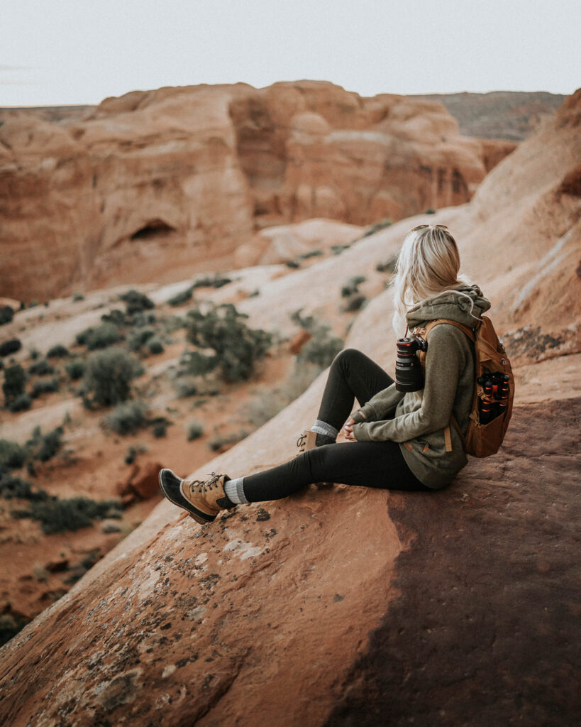 Girl Hiking Arches National Park in Sorel Boots
