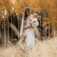 family photo session for mom and kids in field in aspens in Flagstaff Arizona